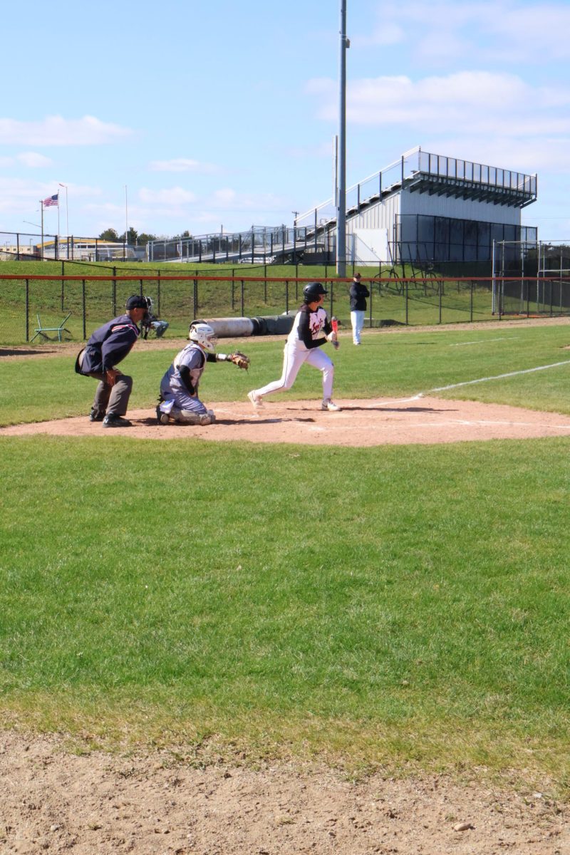 Squaring, senior Noah Dotson attempts to bunt. On Apr. 25, the varsity baseball team played Kearsley winning 7-2.