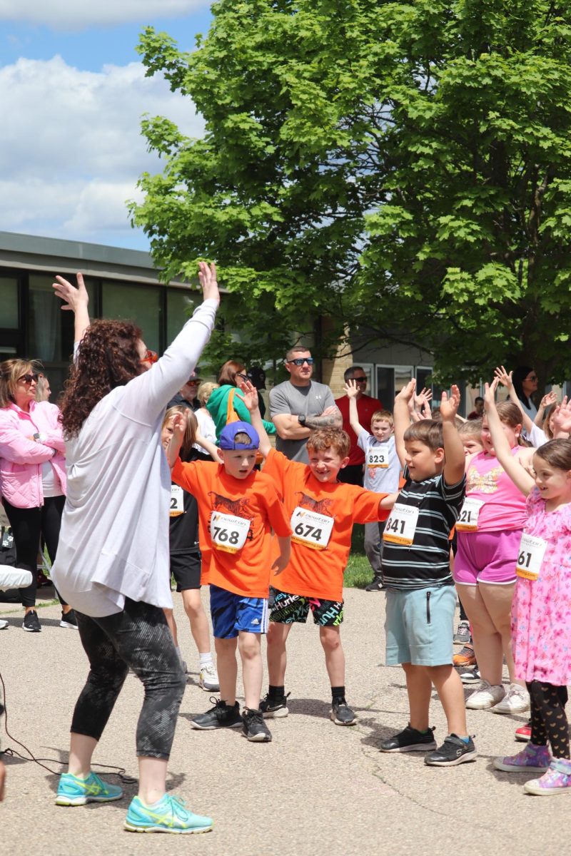 Dancing, Mrs. Slaughter exercise to warm up for their run. On May 10, State Road Elementary School held their annual Fun Run.