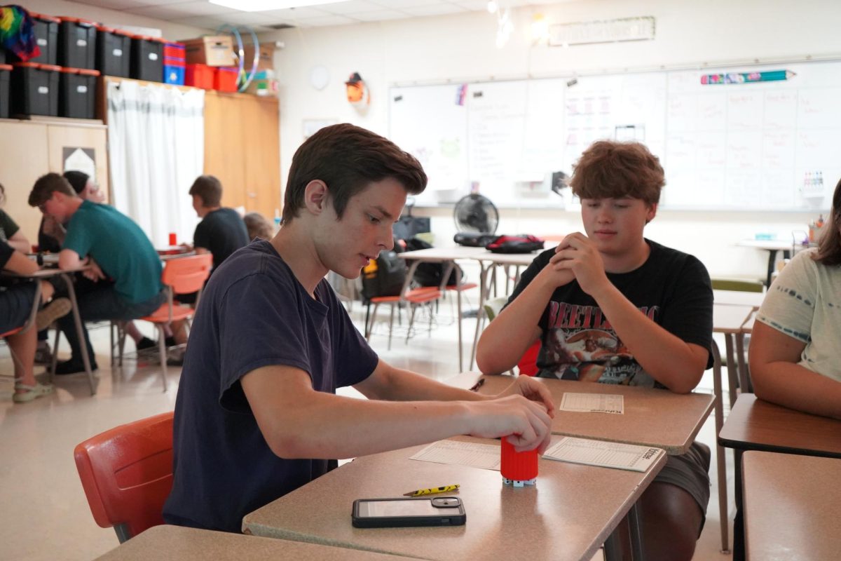 Rolling, Sophomore Daniel Knuth Plays in the yahtzee tournament on sep 20th  in mrs hazlets room.
