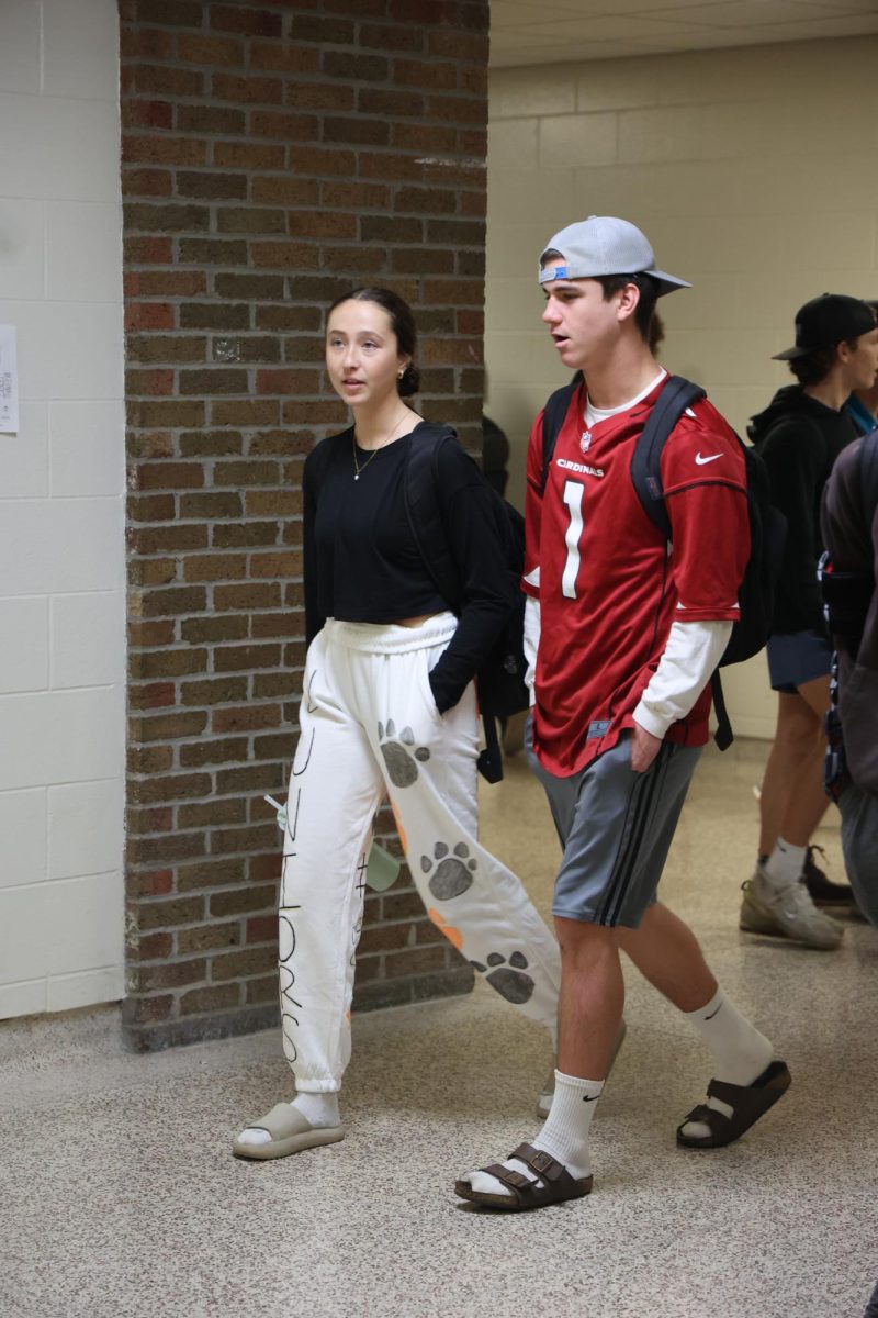 Walking in the halls, junior Luke Dotson participates in Adam Sandler Day. On Sept. 23, FHS starts their HOCO spirit week.