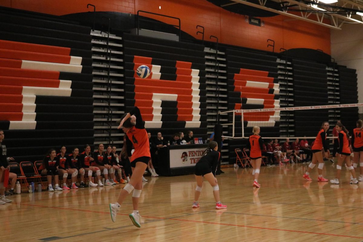 Serving freshmen Sophia Hodges is starting the game.  Sept. 9 Freshmen Volleyball competed against Holly and won all three sets.