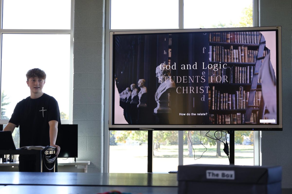 Preaching, freshman Easton Willingham leads the students for christ club. On Oct. 10  the students for christ club had a meeting in the project room.