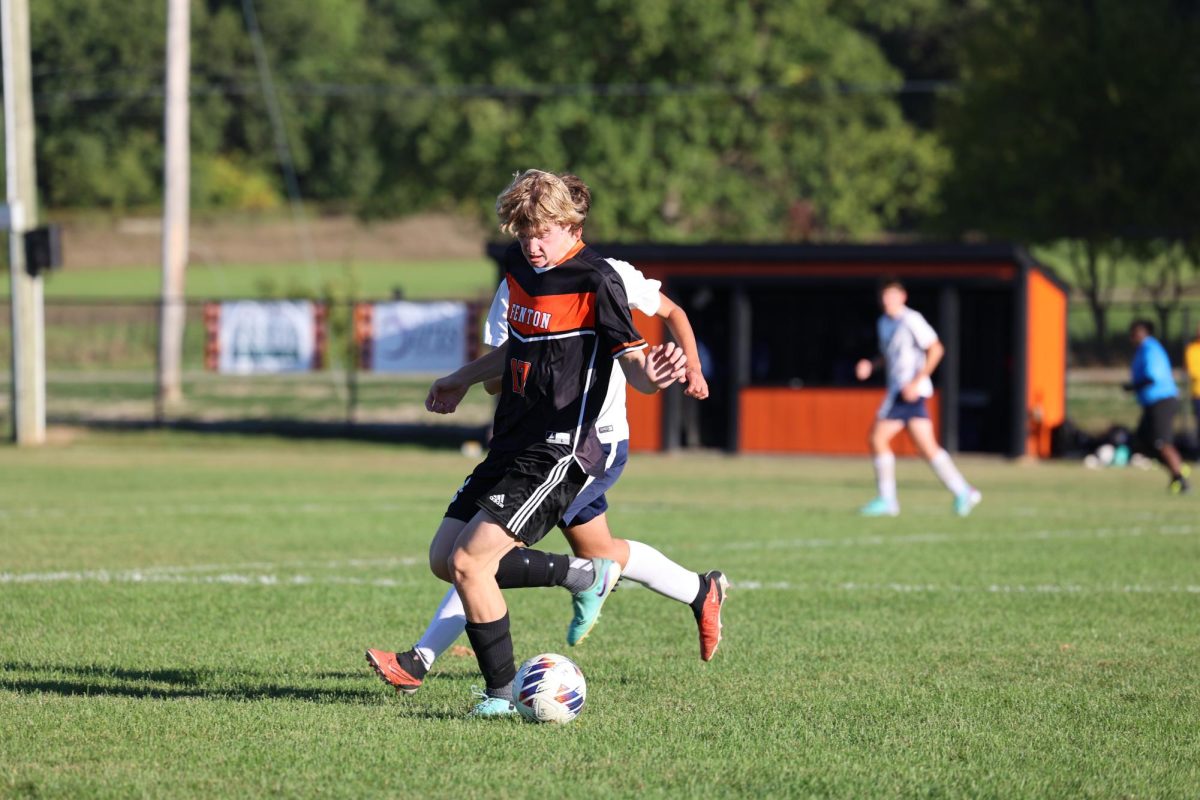 Defending the ball, sophomore Jackson Martin on the FHS Boys JV Soccer Team played Goodrich. On Oct. 2, the Tigers won 2-1.