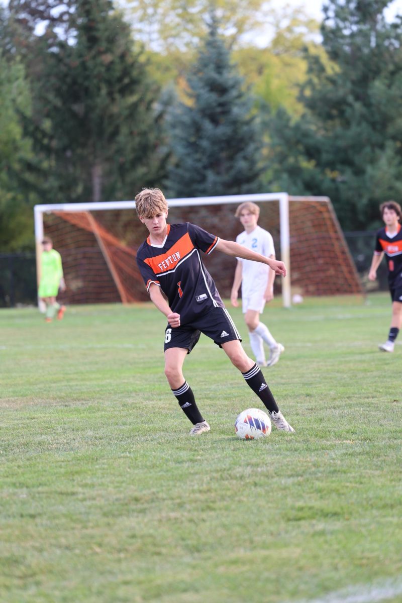 Running with the ball, sophomore Lewis Roberts attempts to get the ball down the field. On Oct. 4, the JV Varsity Boys Soccer Team played Lakeland and lost 0-3.