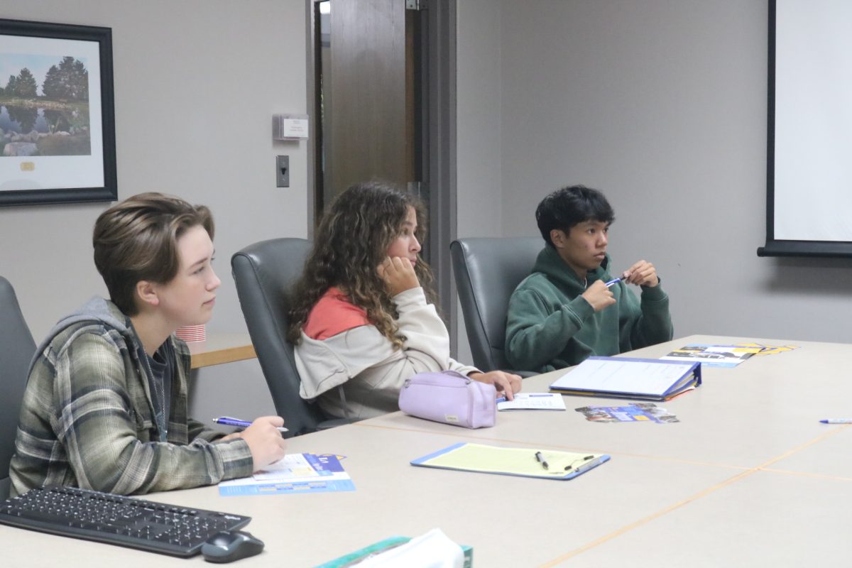 Intently listening, sophomore Isabelle Ice is hearing what Kettering University has to offer. On Oct. 3, FHS had a Kettering administrator come to help inform students that are looking for a collage to attend.  