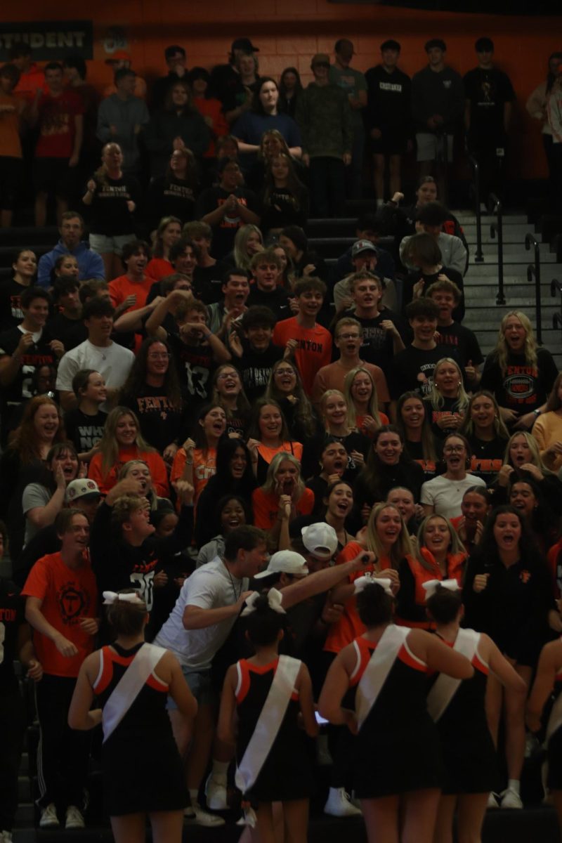 Chanting, senior Alexandria Shouse, Shyanne Baker, and others lean into the microphone. On Sept. 27 the FHS held their annual pep rally hosted during hoco week.