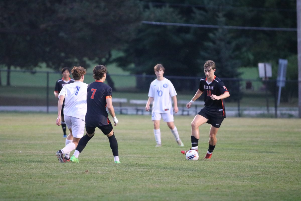 Eyes on the ball, senior Jack Oberle advances up the field. On Sept. 30th, the Tigers went up against Lake Fenton High winning 4-0. 