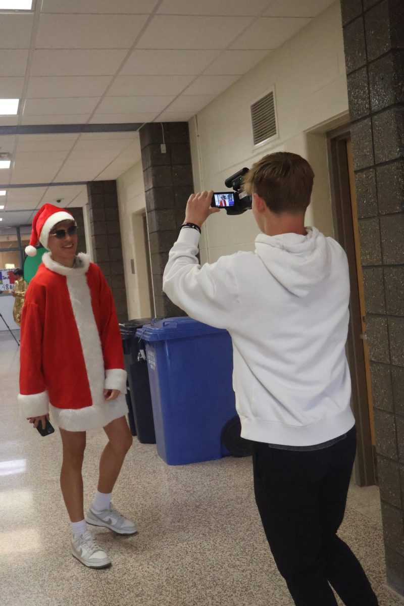 Smiling, sophomore Gentry Watson sang his heart out for a music video in Mr. Smith's class.