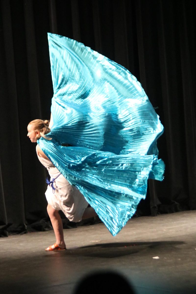 Frolocking, sophomore Macie Dunkel runs on stage during the FHS School play. On Nov. 7, Mr Basin's drama students put on the play "The Greek Mythology Olmpiaganza".