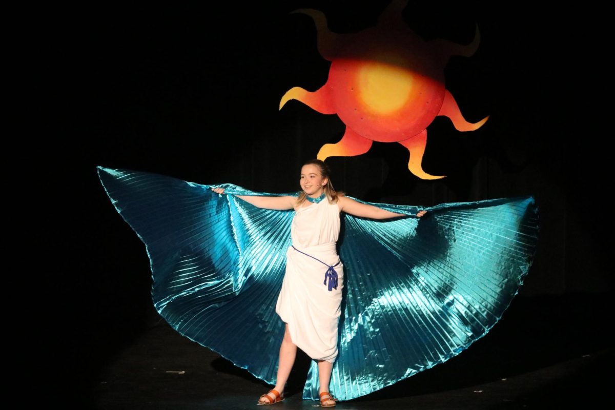 Performing, sophomore Macie Dunkel takes part in a play. On Nov. 9, the FHS theatre group put on their show "The Greek Mythology Olympiaganza."