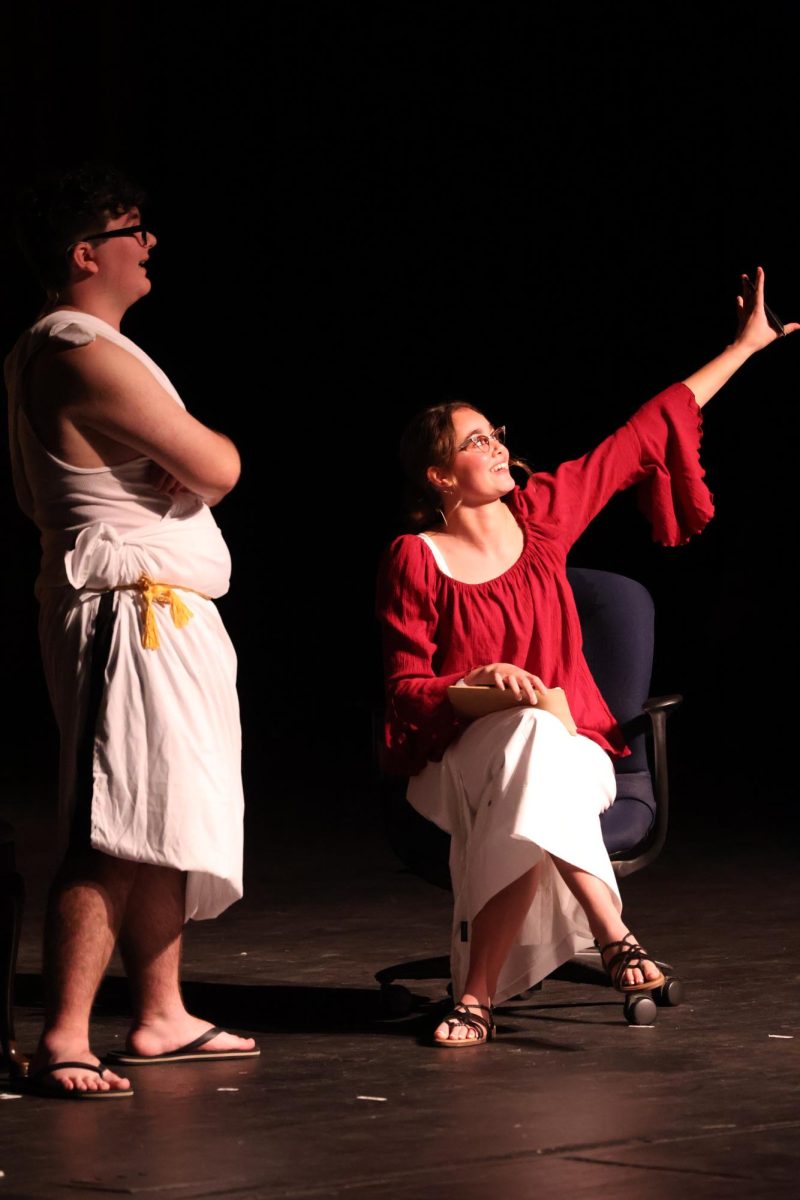 Looking into the distance, senior Laila Blackwell and sophomore Gage Ogle perform. On Nov. 8 the FHS theatre group took on the play of, "The Greek Mythology Olmpiaganza".