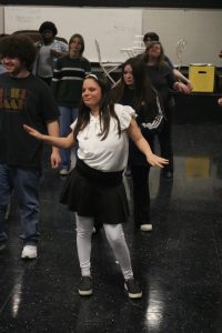 Dancing, senior Isabella Kozlesky performs a dance routine. On Nov. 19, the theater department held auditions for the musical Charlie and the Chocolate Factory.