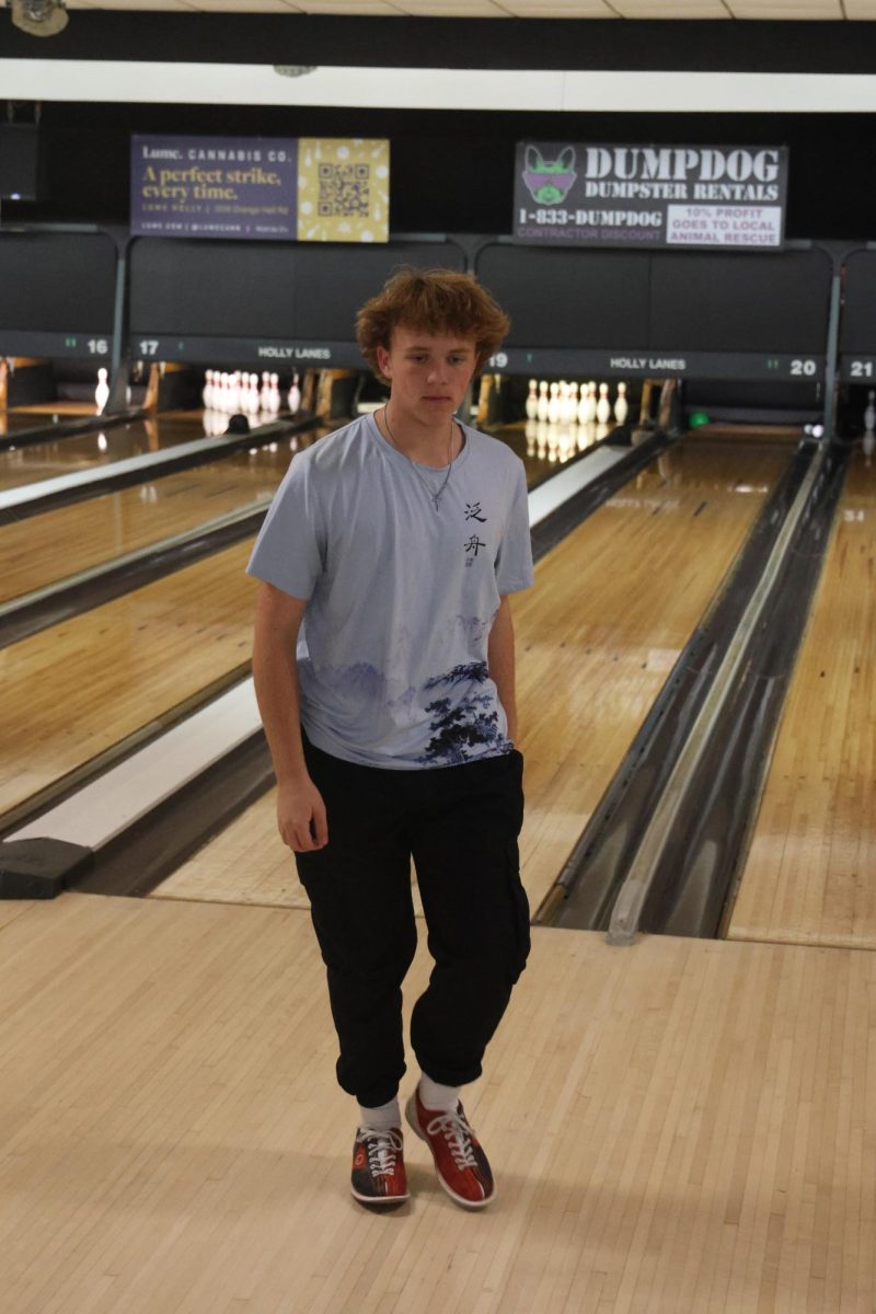 Bowling, Senior Evan Jaworski participates in the band bowling fundraiser. On Nov, 8 the band held a fundraiser at holly lanes.
