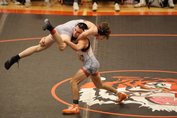 Slamming, senior Owen Freeman Wins his 100th match. On Dec. 11, Fenton hosted the Coed wrestling meet and placed first overall.