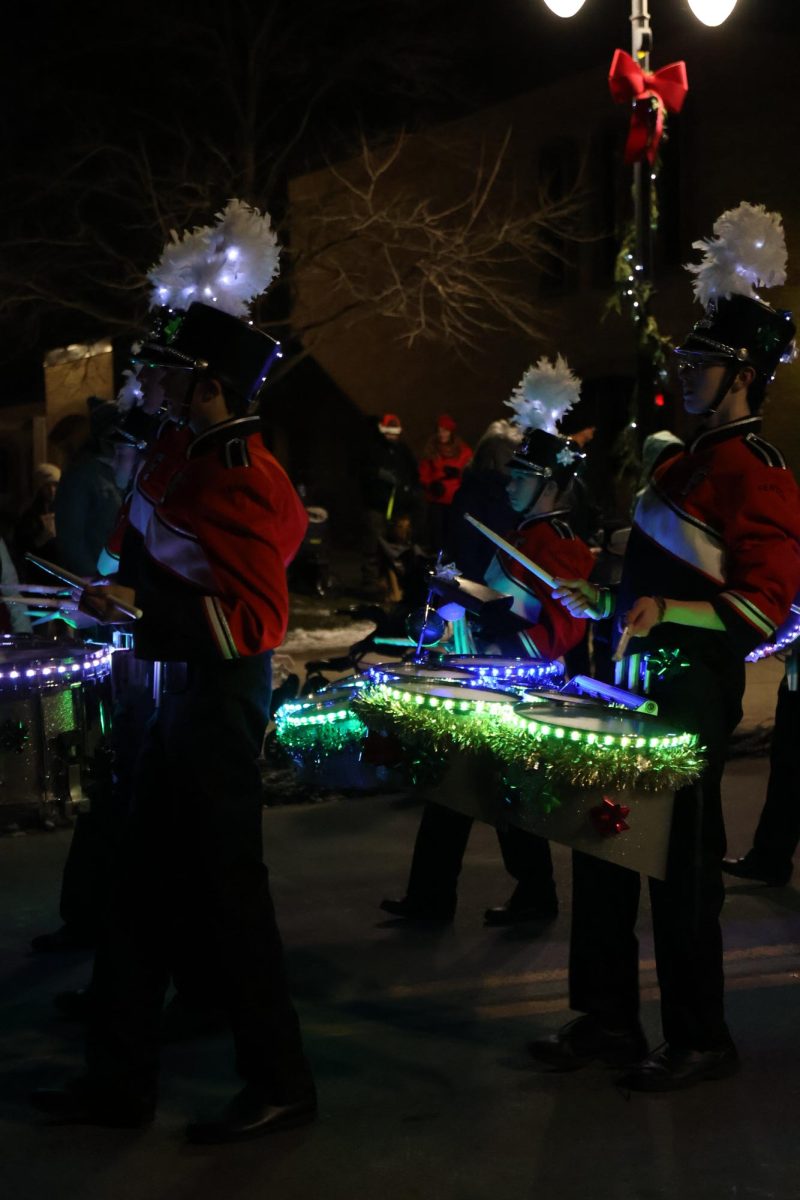 Walking, the FHS Marching Band participates in the parade. On Dec. 7, Fenton held their annual event.