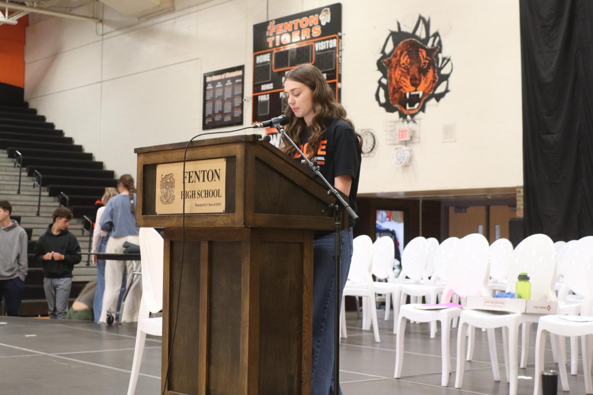 Speaking, senior Gwen Grove practices her speech she will give as valedictorian. On May 20, seniors practiced their graduation ceremony. 