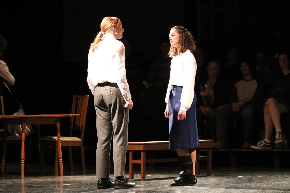 Acting, senior Laila Blackwell and junior Ash Holmes play their roles. On May 2, the IB theatre class held a play of "Our Town." 