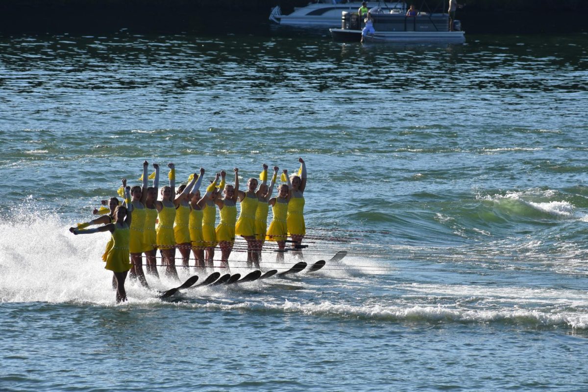 Posing, the girls ballet line looks to the crowd. On July 22, the Silver Lake Ski show team held a performance. 
