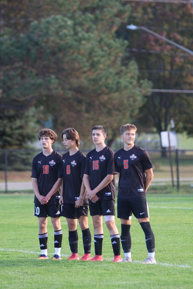 Waiting for the ball, freshman Ben Koscielniak,  Jack Mitchell sophomore Brett Tower and junior Grant Geiersbach are standing attempting to block the ball from the goal. On oct. 1 Jv soccer played flushing and won 3-1. 

