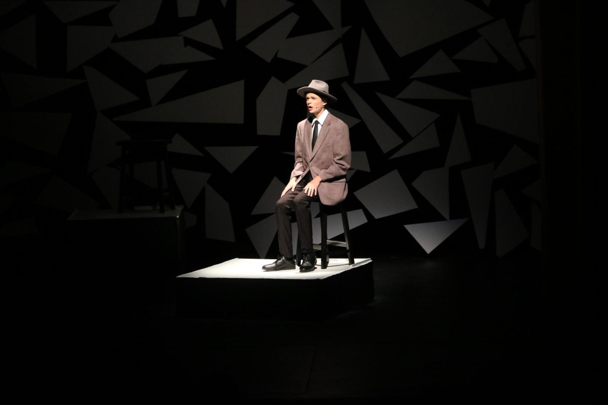Ensnaring the audience, sophomore Lennon Paxton stars in a Fenton production. On Oct. 3, Fenton High School puts on the  play in the Ruby Zeema Auditorium.