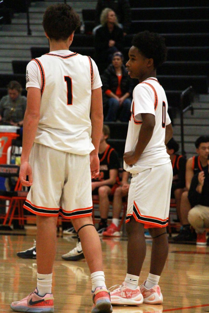 Talking, Sophomores Brady Pearson and Josh Vardon are discussing their game plan. The Fenton JV team lost their game to Flushing 62-53.