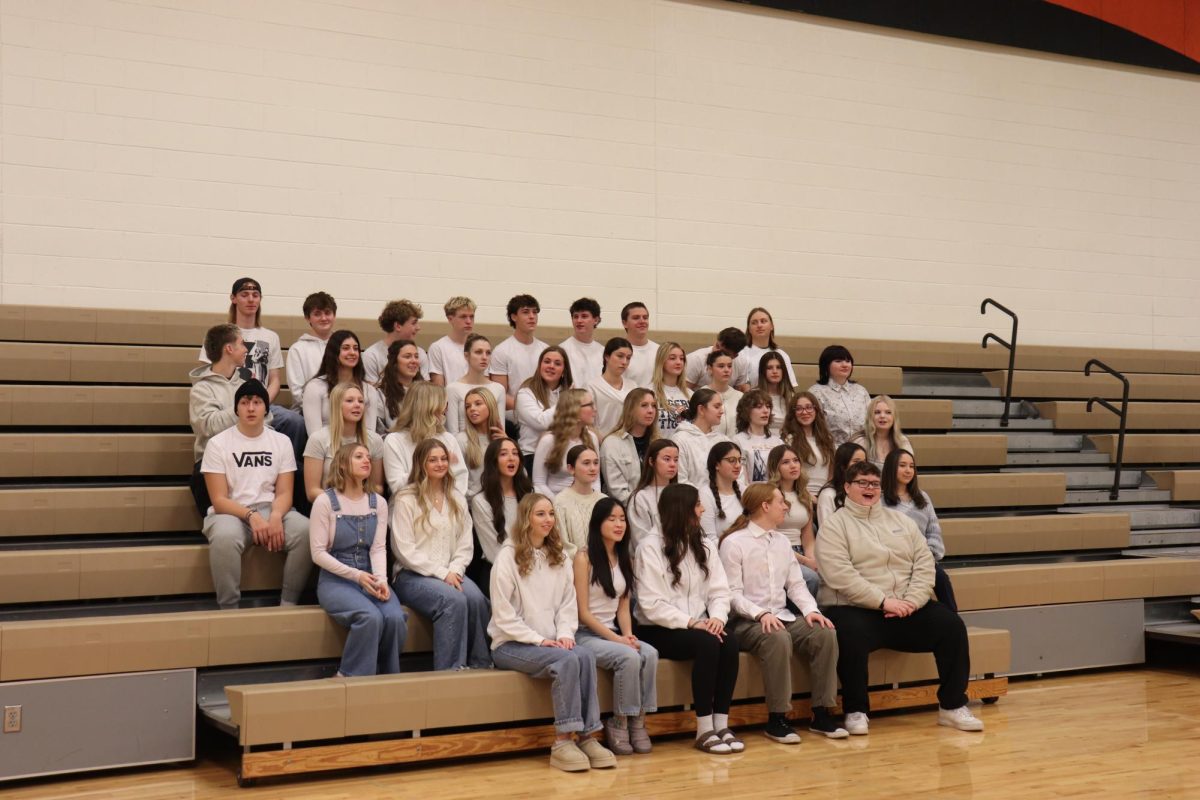Preparing for a picture, National Honor Society Seniors get their picture taken for the yearbook. On Jan. 6, club photos were taken for the Fentonian.