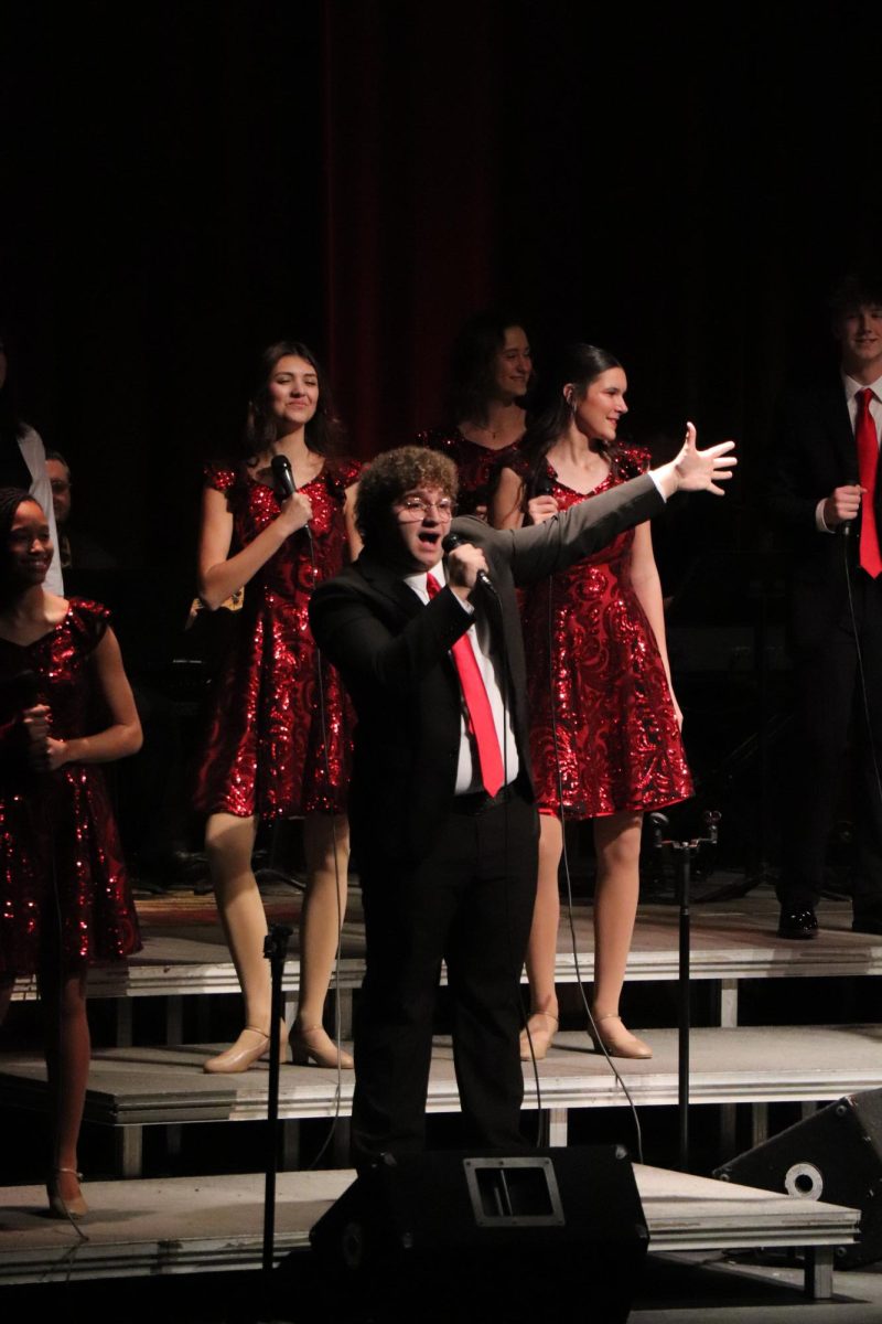 Introducing himself to the crowd, Junior Hudson Dyer performs with the rest of the ambassadors. On Feb, 21 the ambassadors perform their back by popular demand show. 
