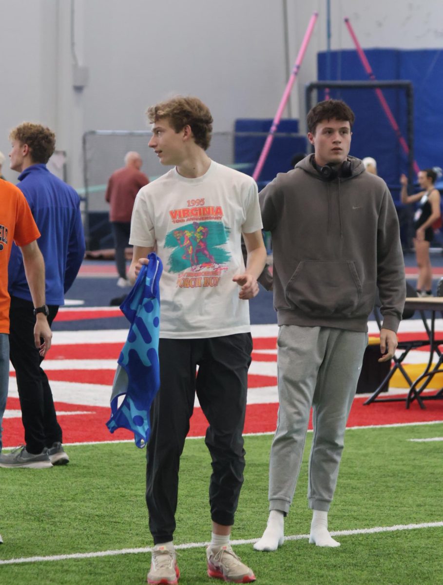 Preparing for his race, sophomore Gavin Katic mentally prepares to run the Fire and Ice 5 K. On Feb 14, the indoor track team went to SVSU to run in the meet. 