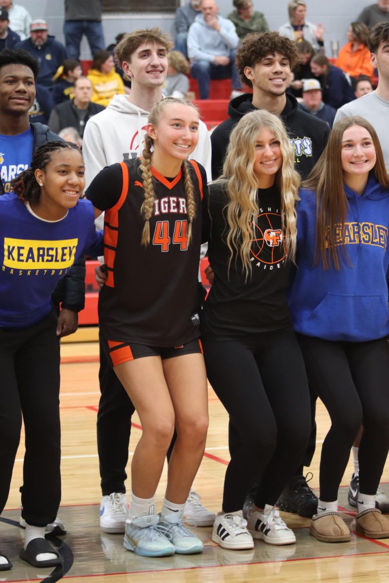 Smiling for the photo, junior Lucy Webber was congratulated for being put on first all-league team. On feb 26, Holly High School hosted the all-league game.  