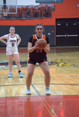 Shooting a free throw, Freshman Stella Rice plays in her basketball game . On Feb. 6 jv girls basketball team took on Linden and lost with a score of 18-25.
