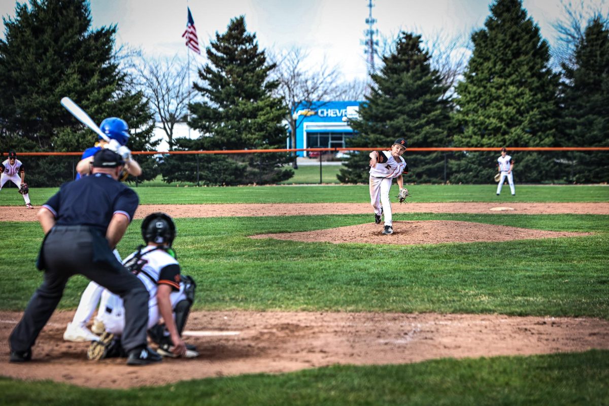 Pitching to the batter, freshman Jack Kopczyk throws the ball. On April 13, the Fenton JV Black team went up against Kearsley.(find score later) 