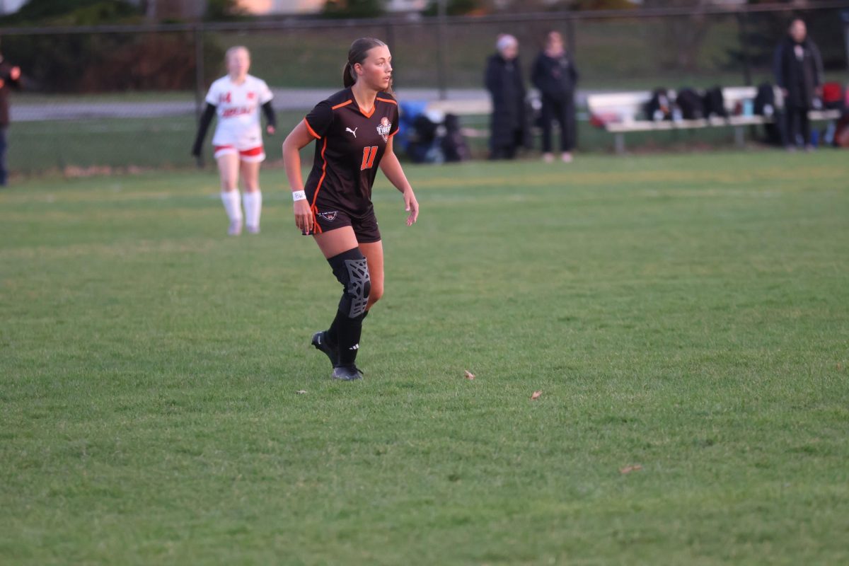 Looking to recieve the ball, senior Skylar Lutz is ready to attack. On April 8, Fenton girls varsity soccer competed against Holly where Fenton ended up winning 3-1.