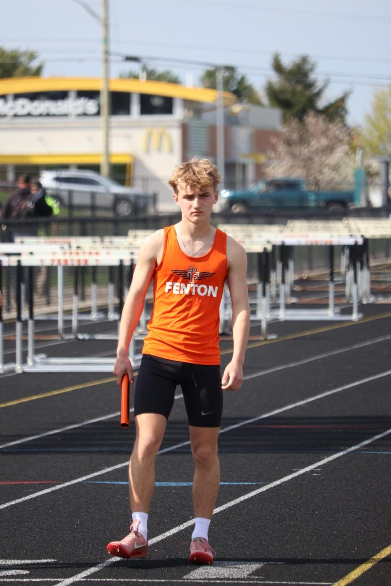 Preparring for his race, sophomore Zachary Panter stands waiting to run. On April 21, the boys Fenton track team lost to Linden 70-66.
