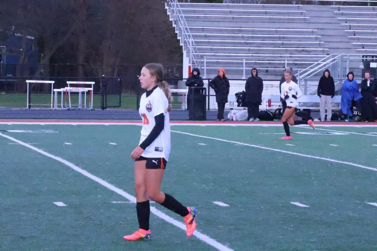 Running to the goal, senior Lauren Chapple and freshman Alyssa Yurk are attacking the defender to steal the ball. On April 6, the Fenton varsity soccer team beat Swartz Creek 2-0
