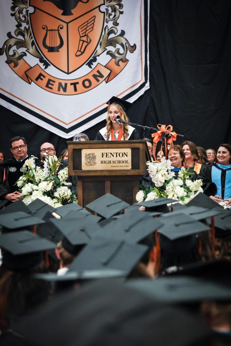 Speaking to the crowd, senior Cassandra Harris delivers her speech. On May 15, Fenton held their graduation ceremony in the gym.